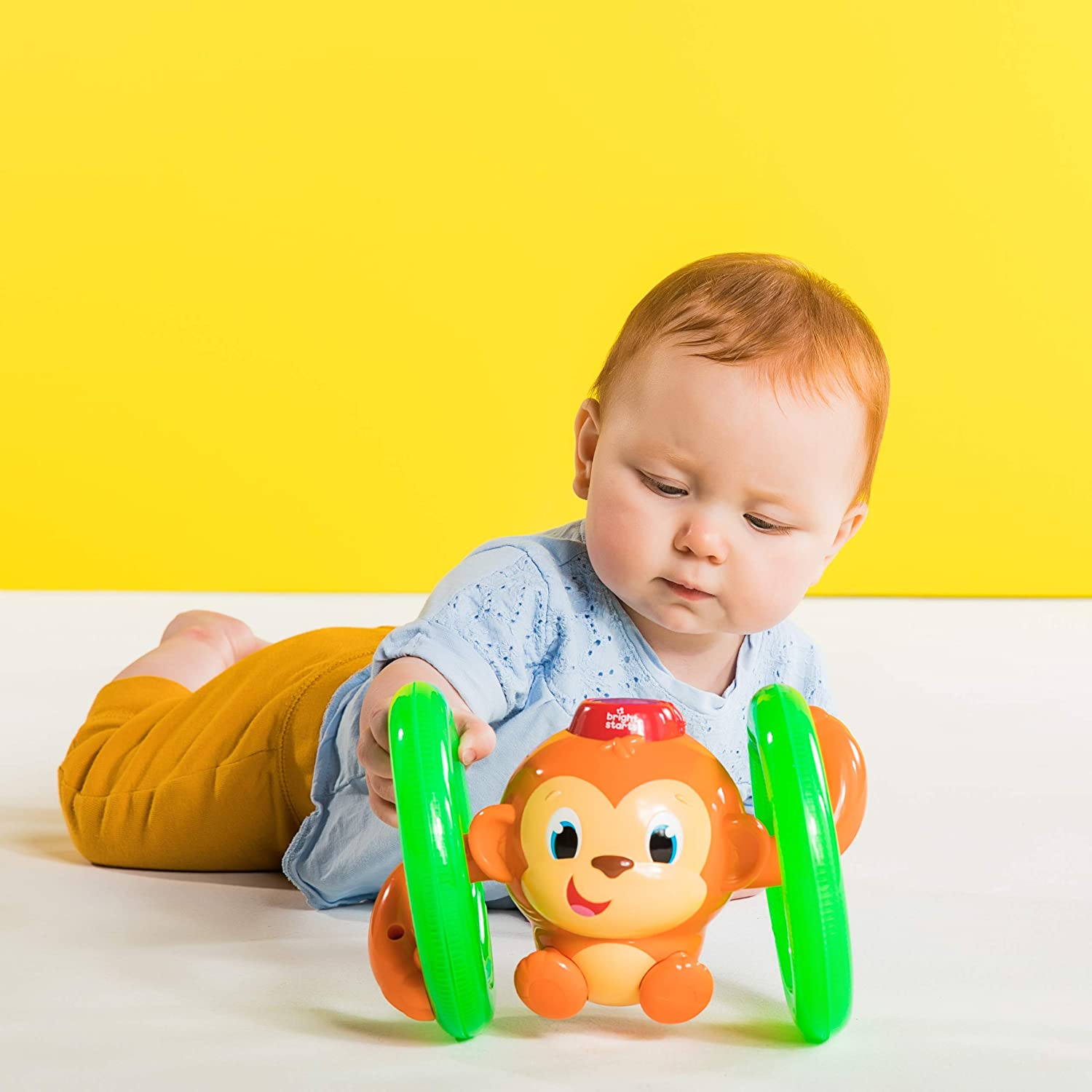 Bright Starts Baby Light Roll and Glow Monkey Top Toys